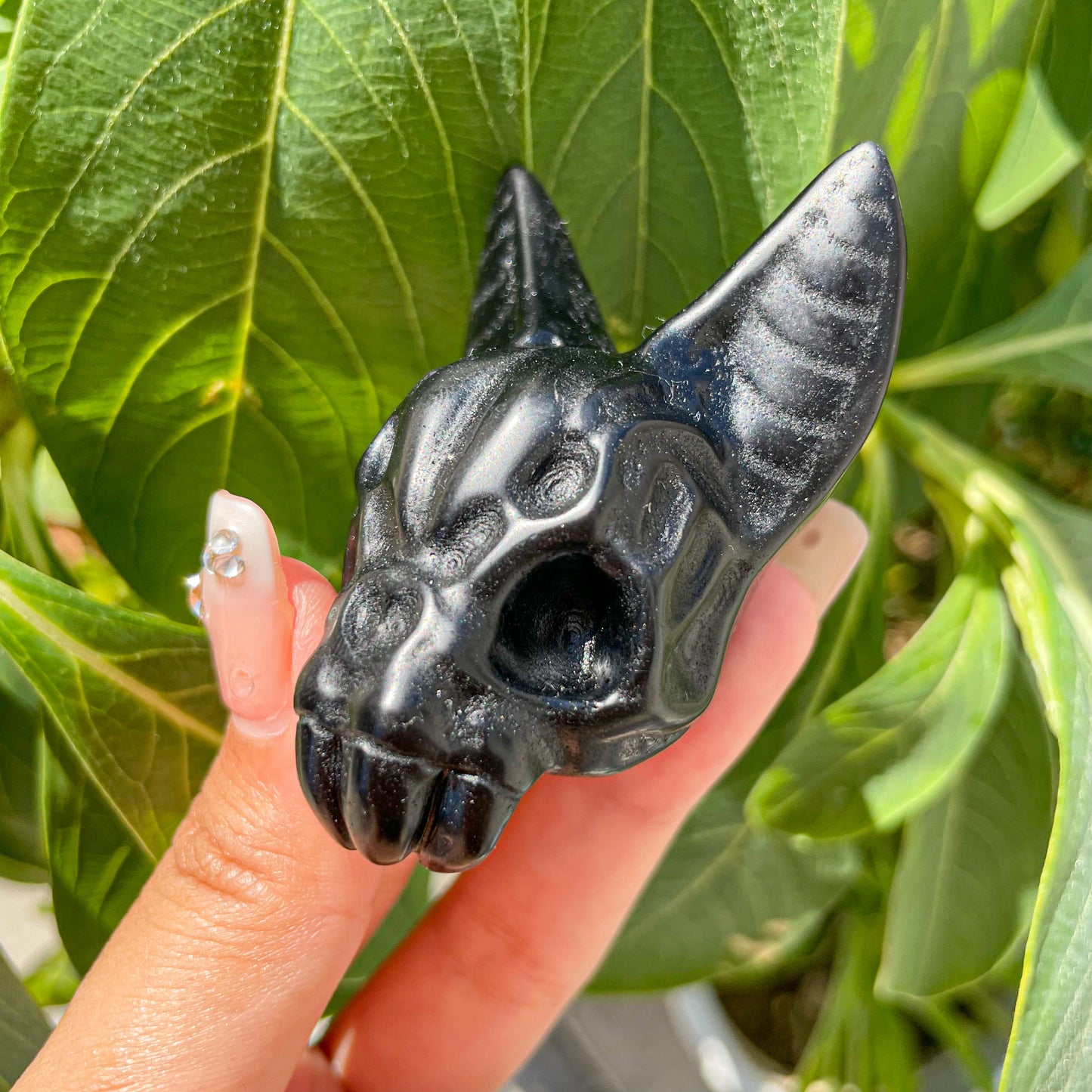 Black obsidian bat head carved